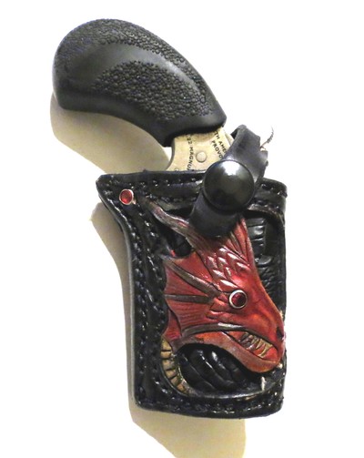 HAND CARVED DRAGON WITH ALLIGATOR INSET
PUG BELT HOLSTERE